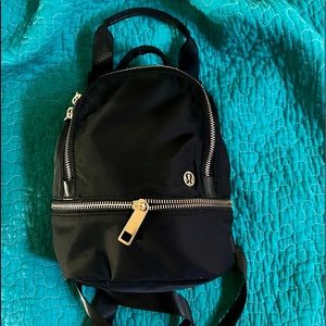 EUC Lululemon small black backpack/crossbody